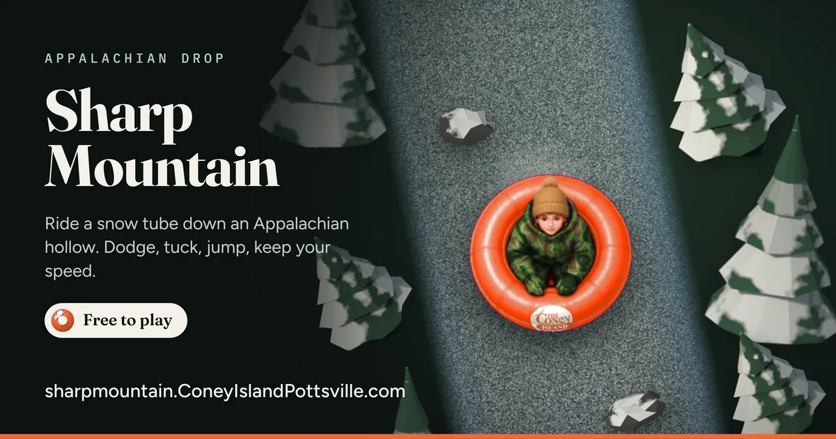 A rider on an orange snow tube carving down a lane between snowy pines
